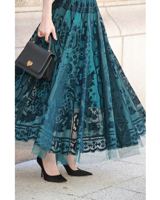 A gorgeous veiled midi skirt with a flocked pattern