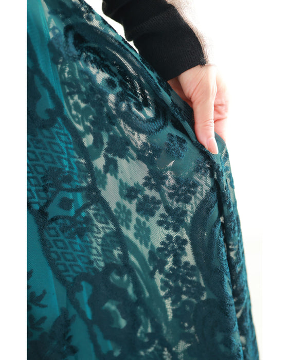A gorgeous veiled midi skirt with a flocked pattern