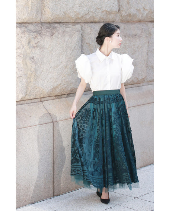 A gorgeous veiled midi skirt with a flocked pattern