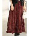 A long skirt with a velour-like texture and a wrinkled, washed look
