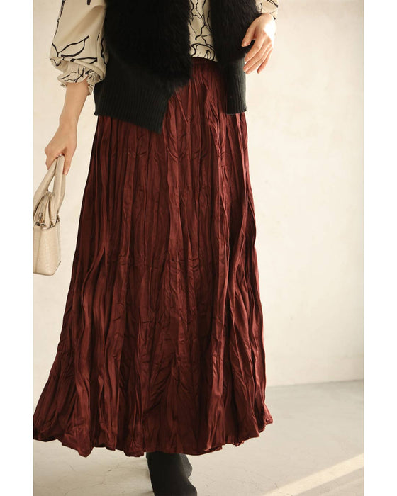 A long skirt with a velour-like texture and a wrinkled, washed look