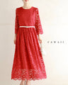 A long dress made entirely of lace and featuring a red dahlia (with belt)