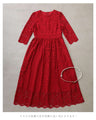 A long dress made entirely of lace and featuring a red dahlia (with belt)