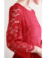 A long dress made entirely of lace and featuring a red dahlia (with belt)