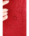 A long dress made entirely of lace and featuring a red dahlia (with belt)