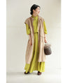 Pistachio color long dress with ruffled diagonal hem (with ribbon)