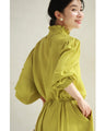Pistachio color long dress with ruffled diagonal hem (with ribbon)