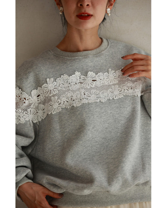Fleece-lined pullover top with flowing white floral lace