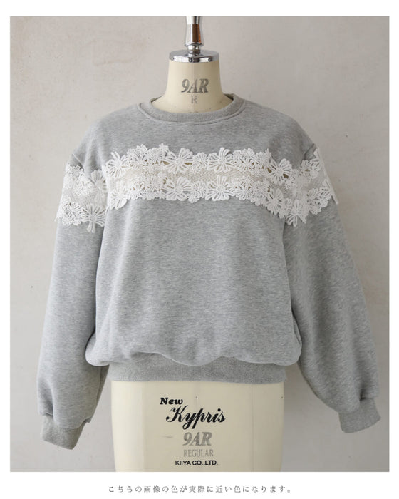 Fleece-lined pullover top with flowing white floral lace