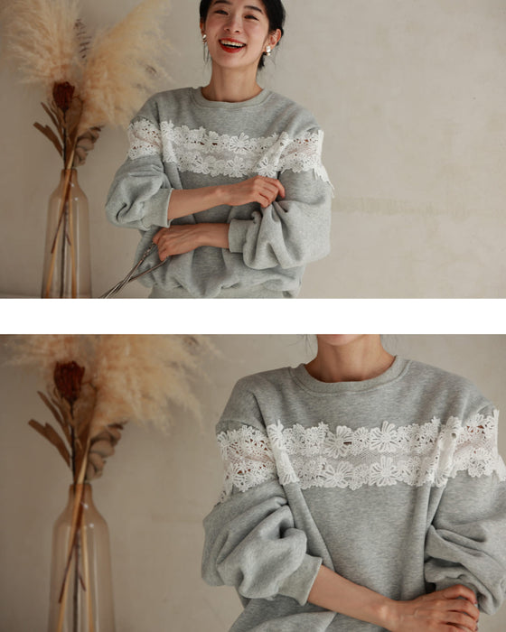Fleece-lined pullover top with flowing white floral lace
