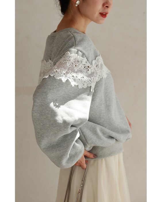 Fleece-lined pullover top with flowing white floral lace