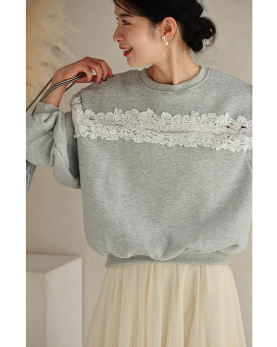 Fleece-lined pullover top with flowing white floral lace