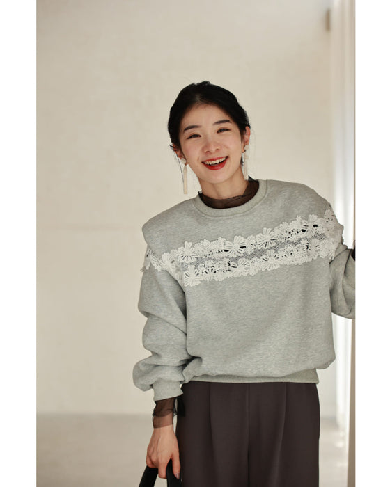 Fleece-lined pullover top with flowing white floral lace
