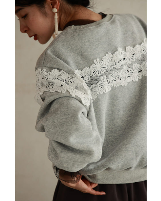 Fleece-lined pullover top with flowing white floral lace
