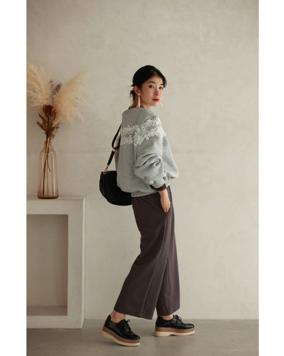 Fleece-lined pullover top with flowing white floral lace