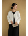 Front ribbon collarless jacket