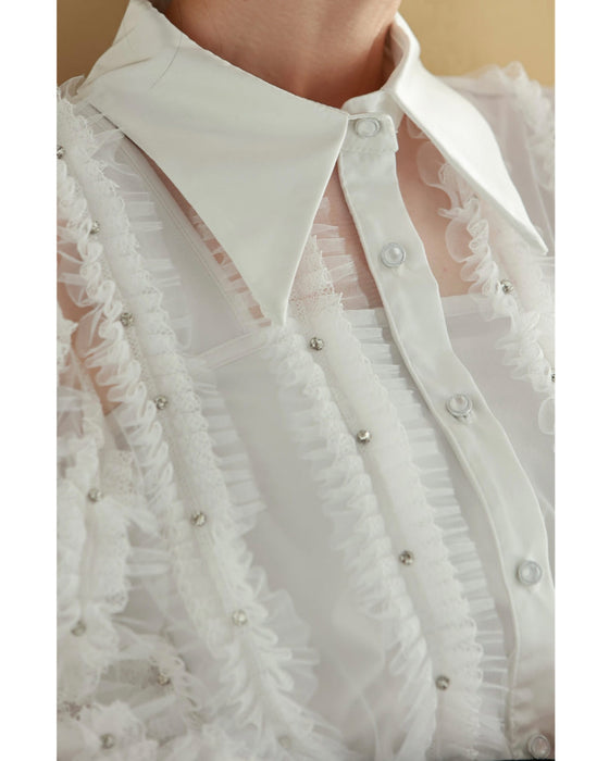 たっぷりフリルとビジュー流れるシアーブラウストップス