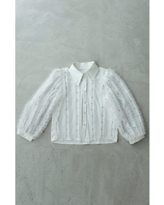 たっぷりフリルとビジュー流れるシアーブラウストップス