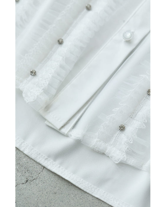 たっぷりフリルとビジュー流れるシアーブラウストップス