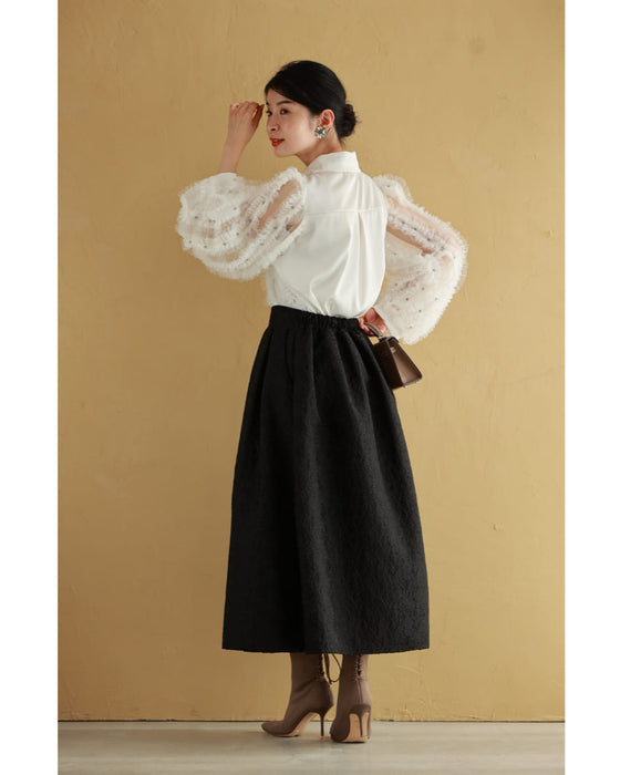 たっぷりフリルとビジュー流れるシアーブラウストップス