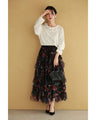 A pullover top with three-dimensional rose lace that brightens up the décolletage