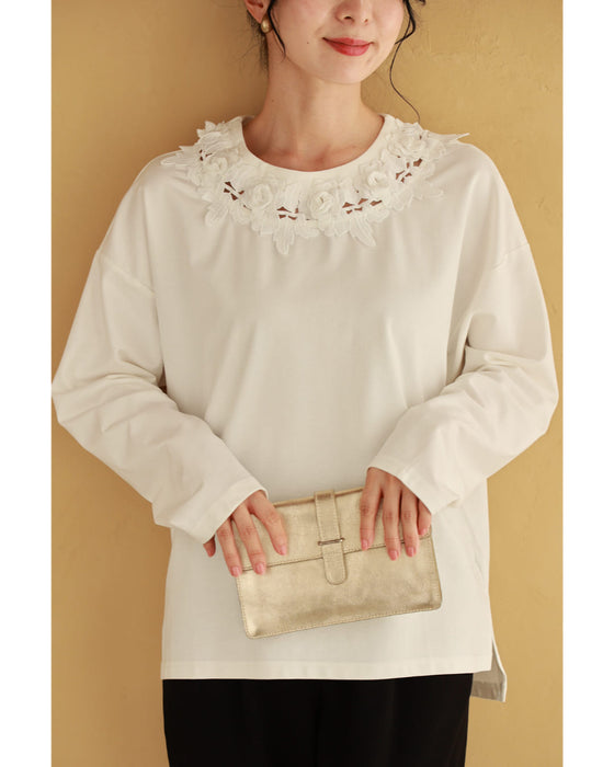 A pullover top with three-dimensional rose lace that brightens up the décolletage
