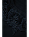 A pullover top with three-dimensional rose lace that brightens up the décolletage