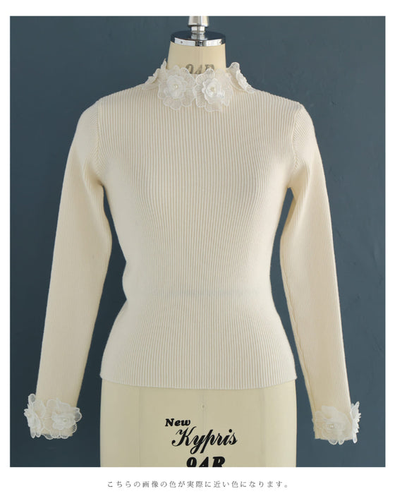 囲む花コサージュのリブニットカットソートップス