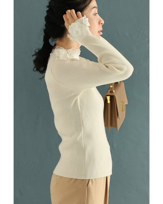 囲む花コサージュのリブニットカットソートップス