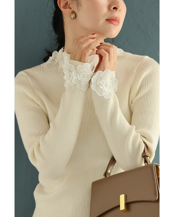 囲む花コサージュのリブニットカットソートップス