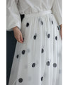 ドット柄舞うシアーミディアムスカート