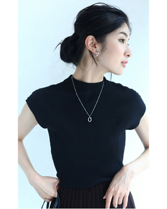 A ribbed knit top that makes you look slimmer even though it's knit (black)