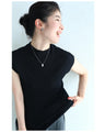 A ribbed knit top that makes you look slimmer even though it's knit (black)