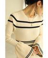A cute, flare-sleeved knit medium-length dress