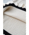 A cute, flare-sleeved knit medium-length dress