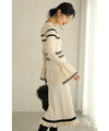 A cute, flare-sleeved knit medium-length dress