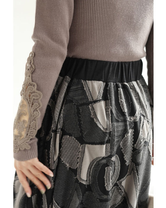 重なり合う柄フレアの個性派ミディアムスカート