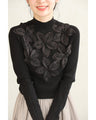 (Black) Sparkling black floral knit top with bejeweled lines