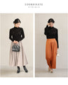 (Black) Sparkling black floral knit top with bejeweled lines