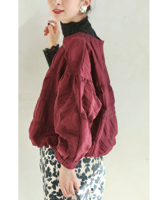 Gathered pullover top with back button