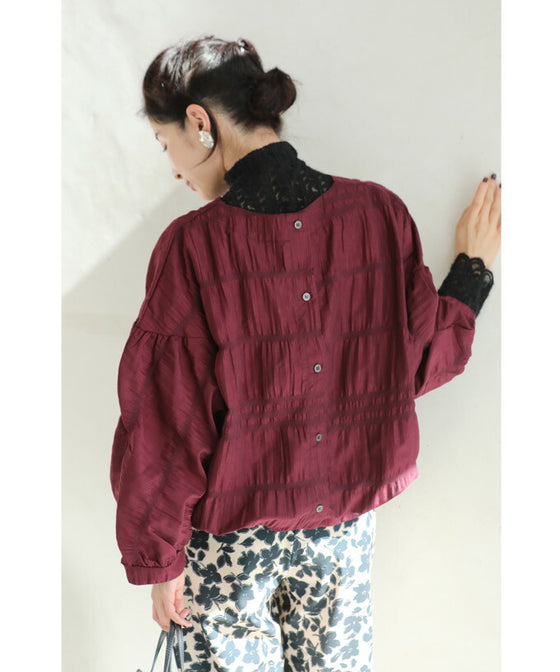 Gathered pullover top with back button