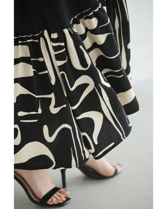 リラクシーな重なるアート柄ロングワンピース