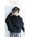 A long knit top with a unique silhouette