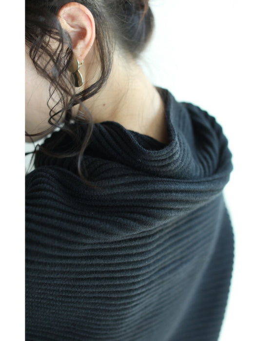 A long knit top with a unique silhouette