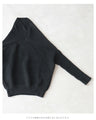 A long knit top with a unique silhouette