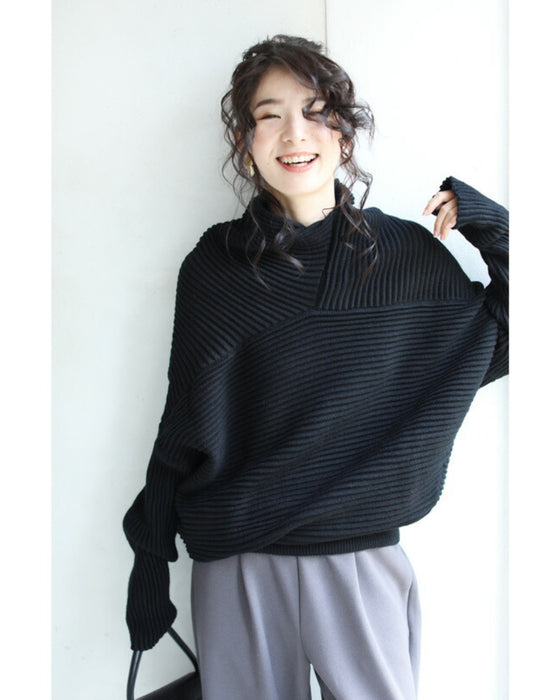 A long knit top with a unique silhouette