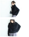 A long knit top with a unique silhouette