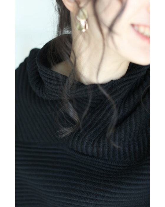 A long knit top with a unique silhouette