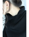 A long knit top with a unique silhouette