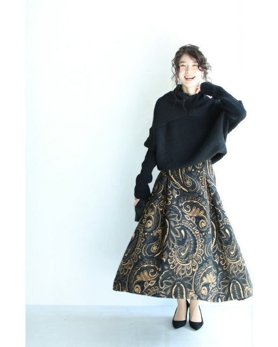 A long knit top with a unique silhouette